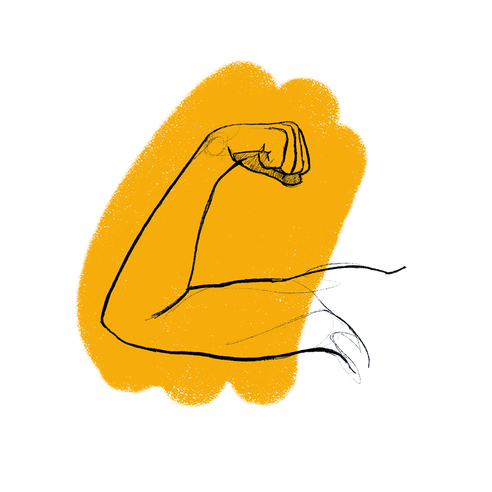 ręka napinająca biceps na żółtym tle